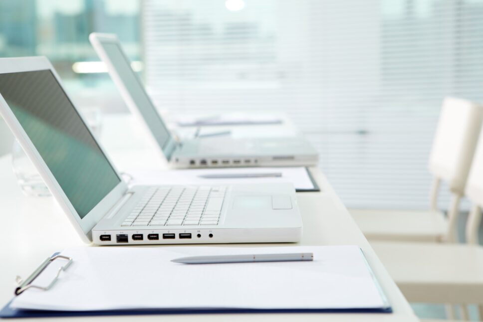 white-laptop-screen-on-desk-shutterstock