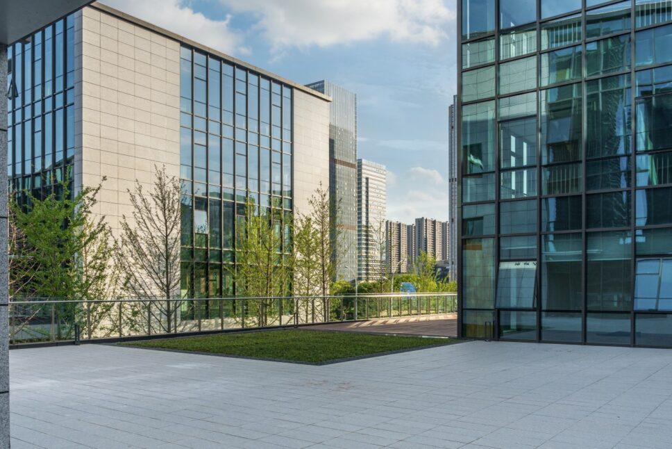 Modern-urban-architecture-featuring-sleek-glass-buildings-and-green-spaces