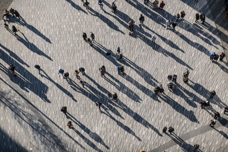 People-crowd-walking-on-around-city-square-view-from-the-top